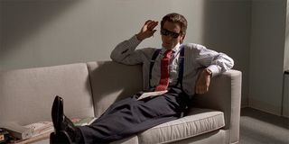 American Psycho Christian Bale as Patrick Bateman on the couch