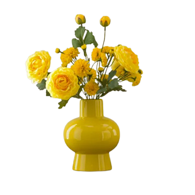 Yellow vase with flowers