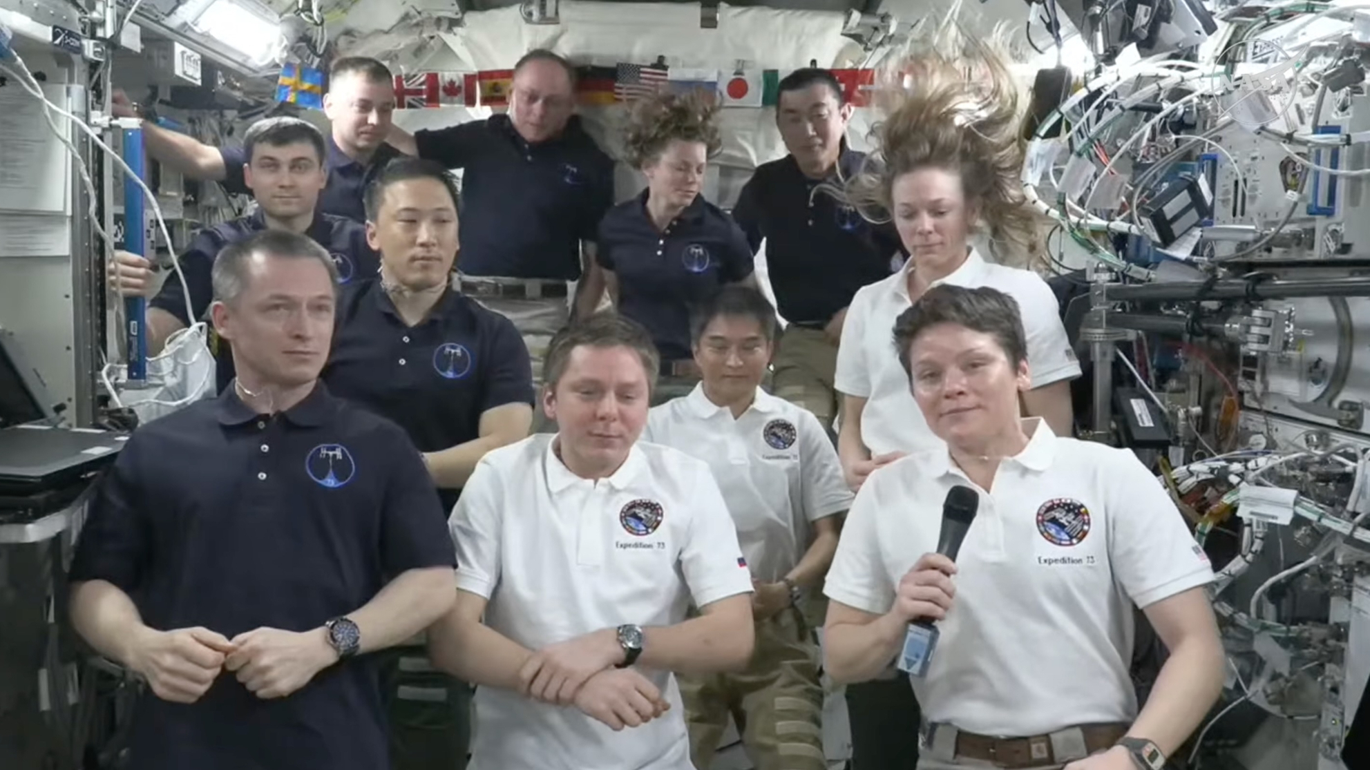 NASA astronaut and Crew-10 commander Anne McClain (bottom right) speaks during a farewell ceremony aboard the International Space Station on Aug. 5, 2025.