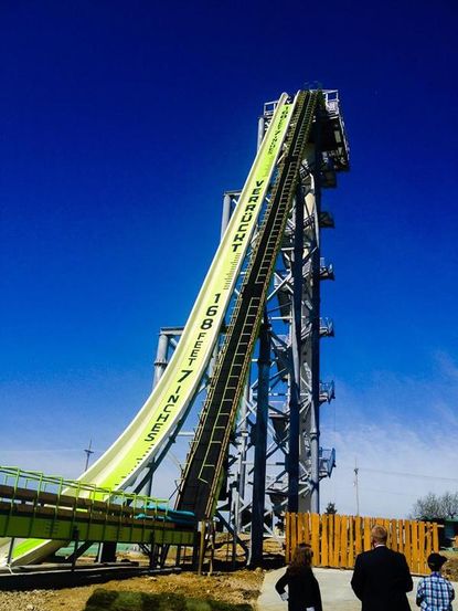 Try not to get queasy watching these guys test the world's tallest water slide