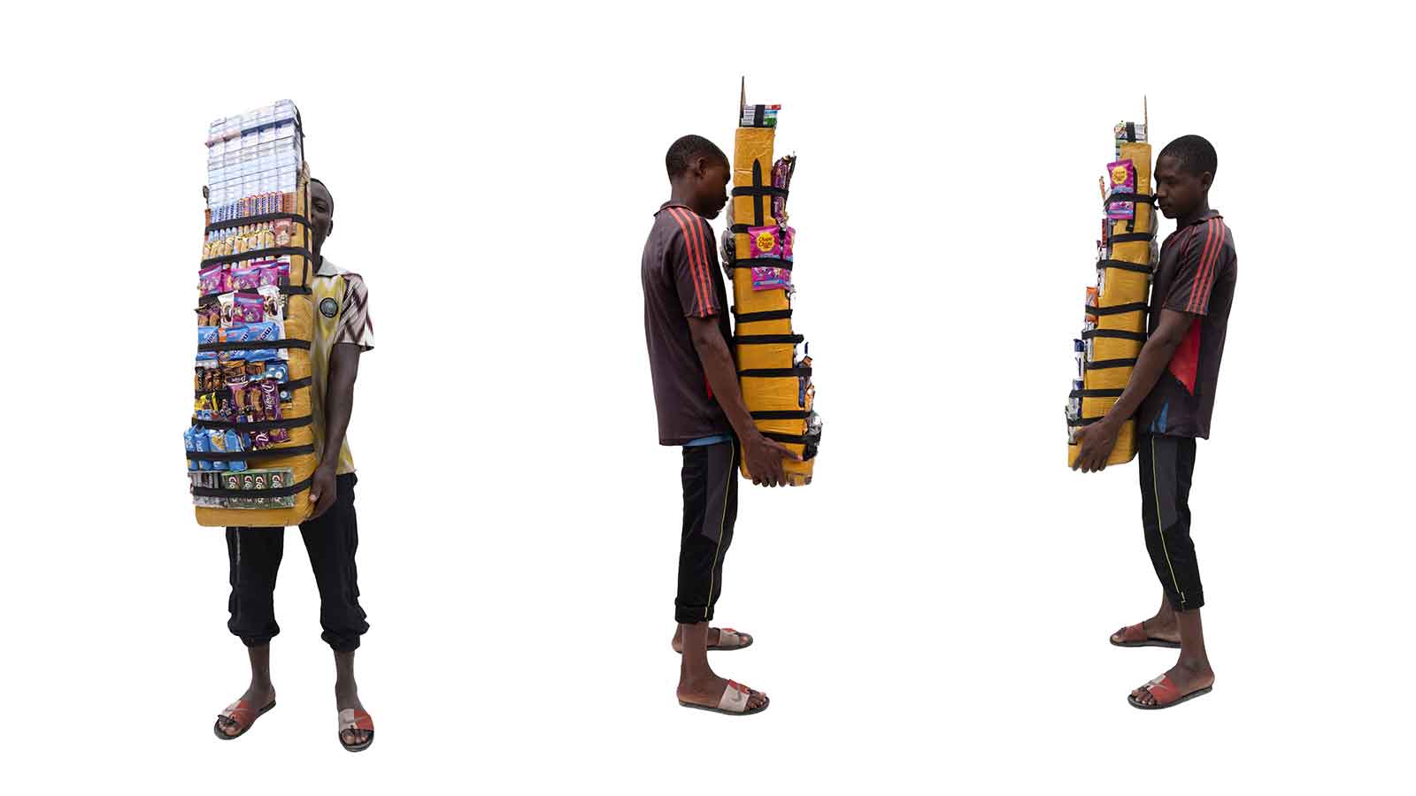 Handheld selling kiosks being carried by a man