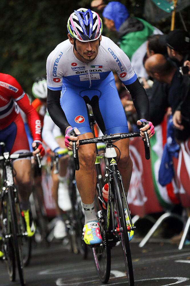 Pozzato racing with the Italian team kit