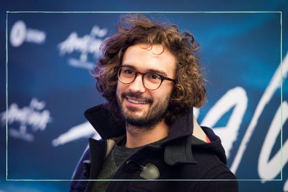 a close up of Joe Wicks wearing glasses and smiling