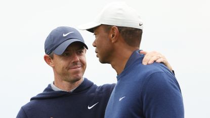 Rory McIlroy and Tiger Woods during a practice before the 2023 Masters