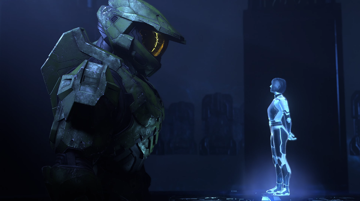 Halo Infinite&#039;s Master Chief staring at a hologram AI