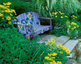 rustic garden ideas: blue painted garden bench