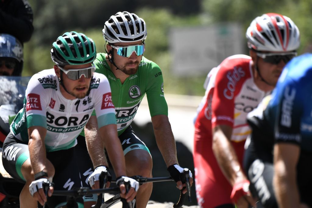 Team Bora rider Slovakias Peter Sagan 2ndL wearing the best sprinters green jersey and the escapees ride ahead during the 2nd stage of the 107th edition of the Tour de France cycling race 187 km between Nice and Nice on August 30 2020 Photo by AnneChristine POUJOULAT AFP Photo by ANNECHRISTINE POUJOULATAFP via Getty Images