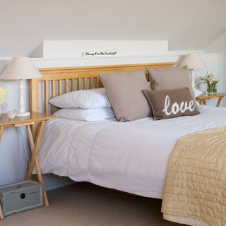 wooden bed bedroom with lamp