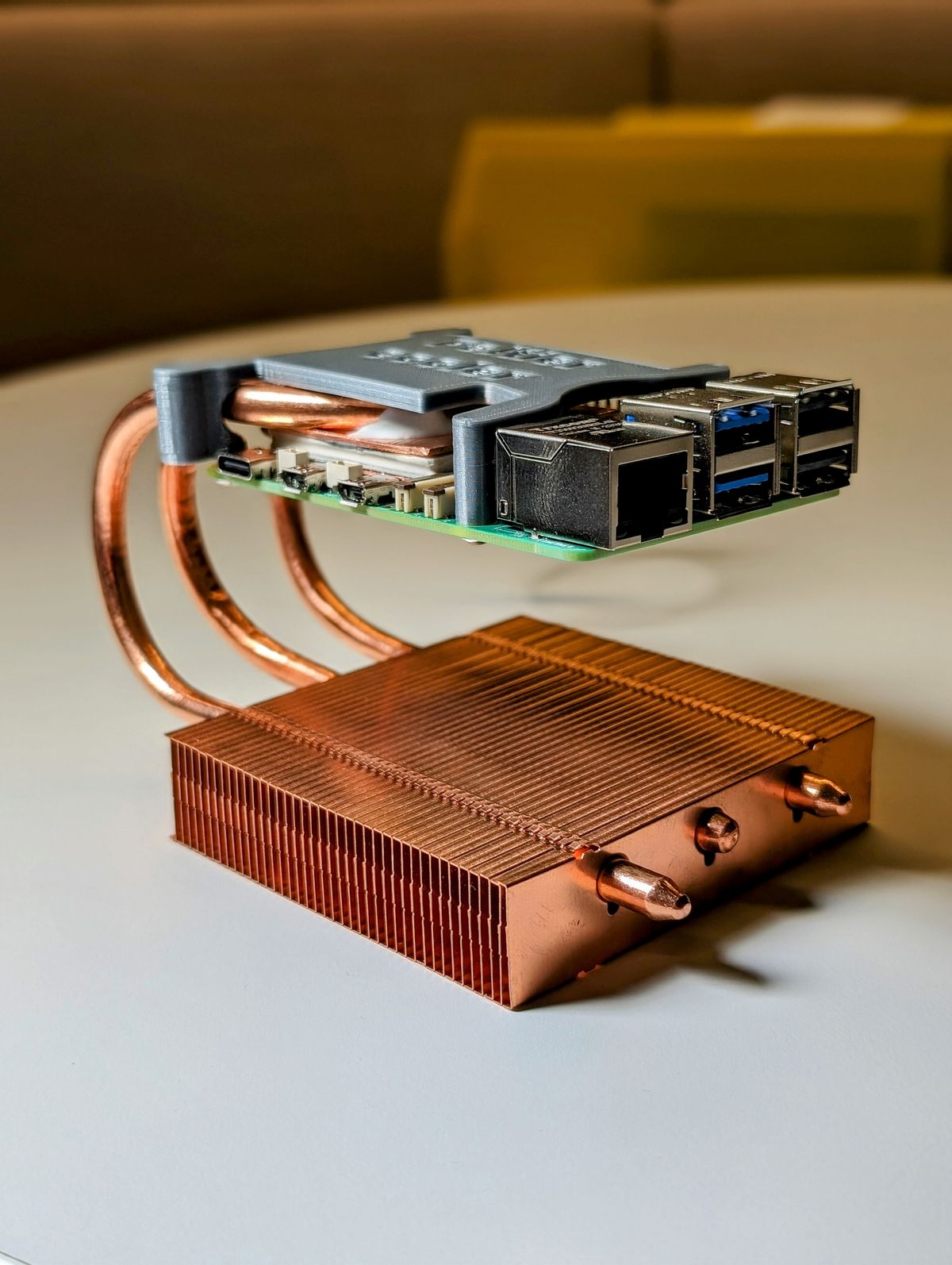Raspberry Pi 5 delidded and cooled using a Peltier element