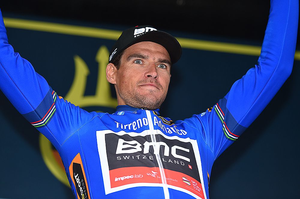 Greg van Avermaet in blue on the final Tirreno-Adriatico podium