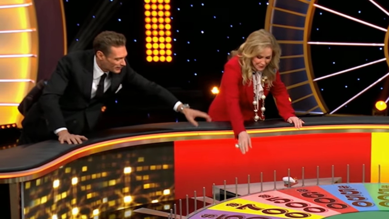 Ryan Seacrest tries to help Kathy Hilton on Celebrity Wheel of Fortune.