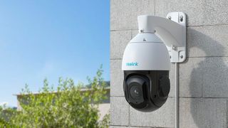 reolink RLC-823A 16x 360-degree security camera with PTZ on wall