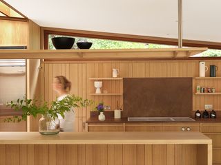 timber clad kitchen in Hampstead House by Coppin Dockray