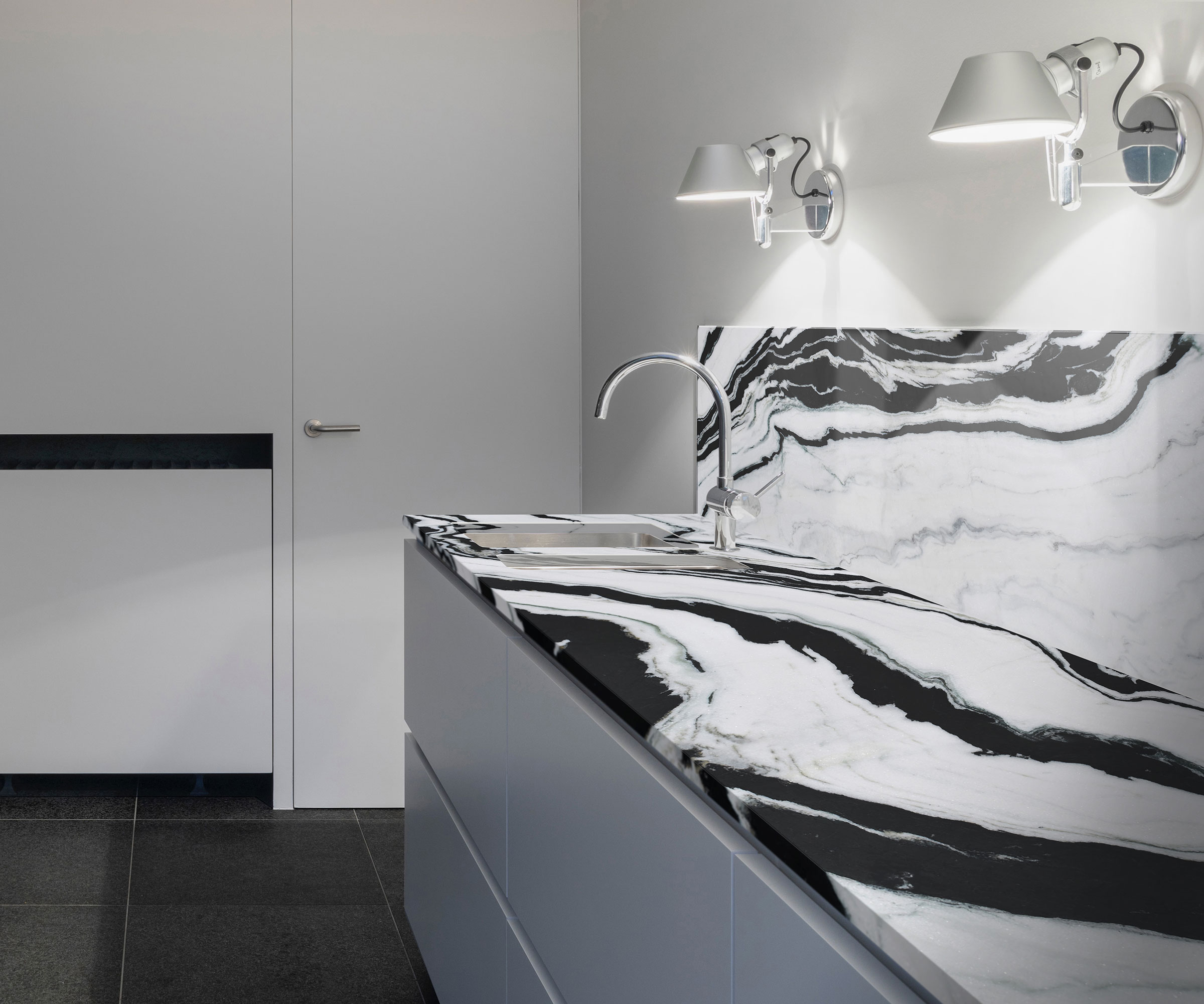 modern white kitchen with Panda Marble worktop