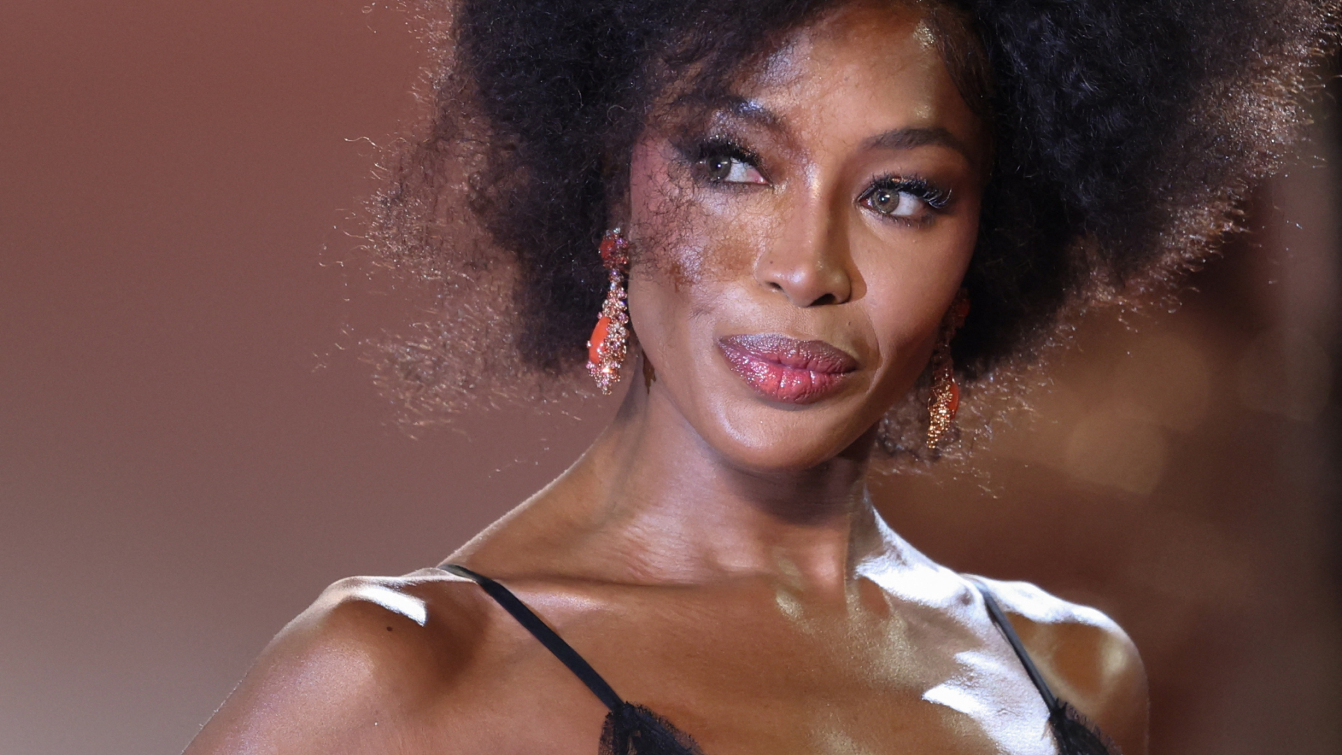 Naomi Campbell wearing a Dolce & Gabbana dress on the 2025 Cannes Film Festival red carpet