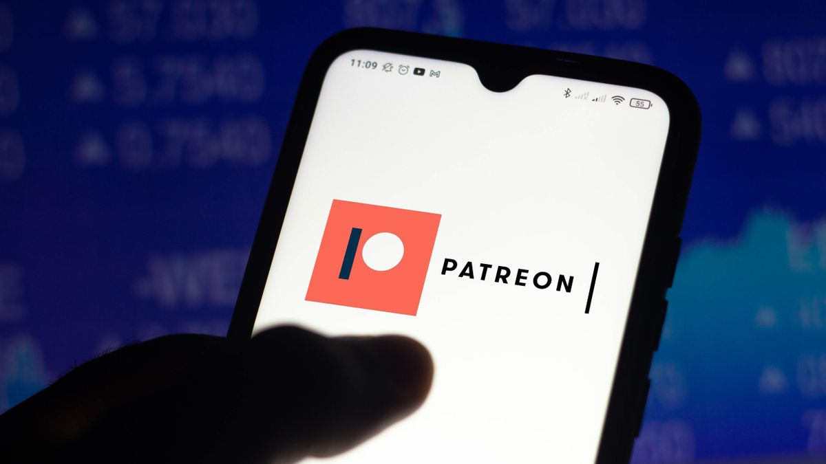 Patreon logo displayed on a smartphone behind a dark blue background