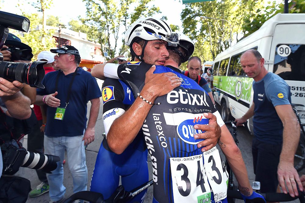 Teammates congratulate Fernando Gaviria after the stage 2 win.