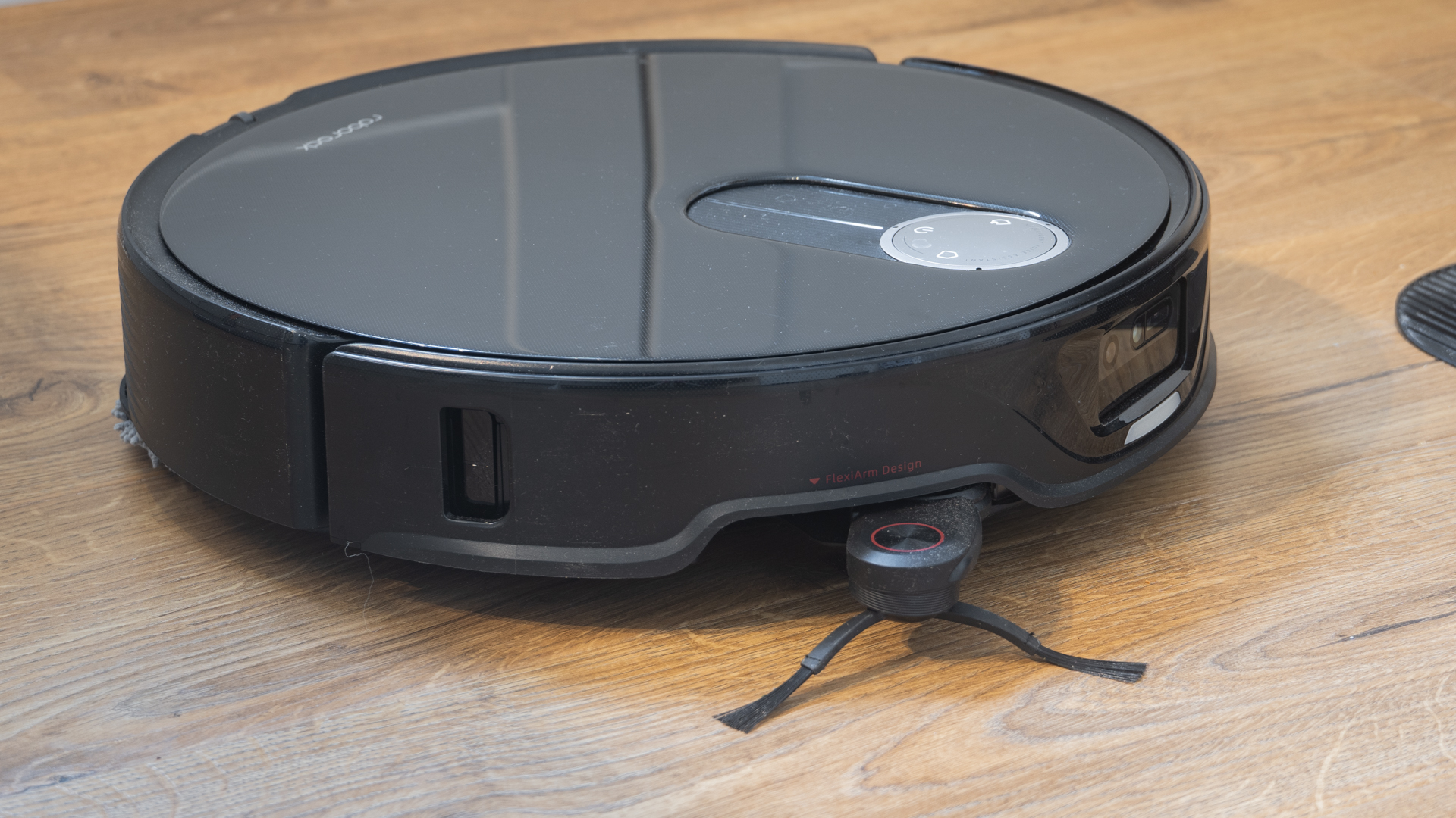 Roborock Qrevo Slim robot vacuum with side brush extended