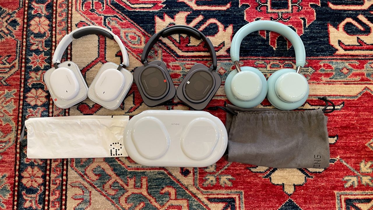 Nothing headphones arranged together, to show the different cases