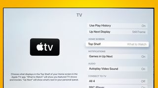 A TV showing the Apple TV menus for the Top Shelf setting
