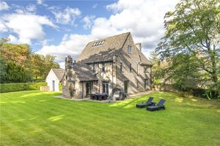 Highlands, Burley in Wharfedale, West Yorkshire. Six-bedroom house with nearly two acres of gardens and a decked balcony, a moment’s walk from the railway station with connections to Leeds. £1.395 million through Dacre, Son & Hartley.