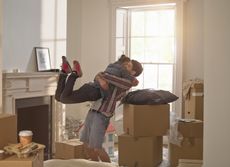 A couple celebrating moving in to a new home