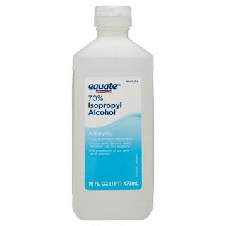 A clear plastic bottle of Equate 70% Isopropyl Alcohol Liquid, 16 Fl Oz, with blue and white label