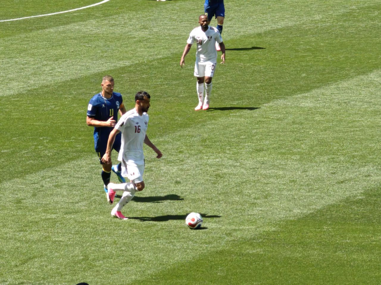A player kicking a ball