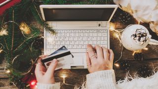 Last minute seasonal shopper begins online shopping at laptop