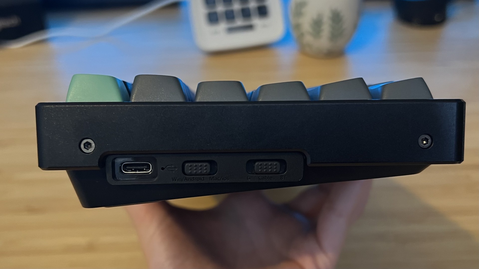 Side view of Keychron K2 Ultra 8K gaming keyboard showing side mounted USB-C port and wireless connection toggles