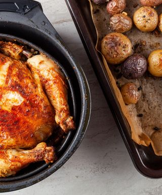 Air fryer in a white tiled kitchen