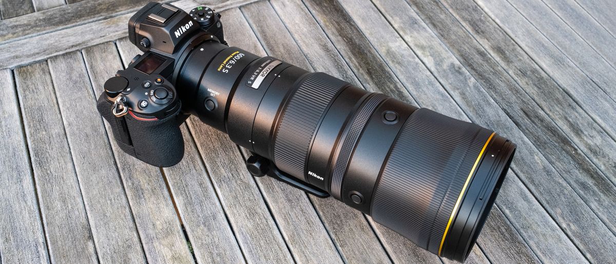 Nikkor Z 600mm f/6.3 VR S attached to a Nikon Z 7II on a frosty wooden table