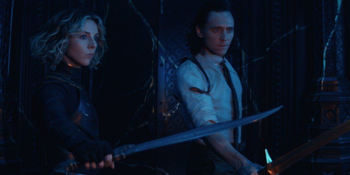 Sylvie (Sophia Di Martino) and Loki (Tom Hiddleston) are armed and ready in Loki (2021)