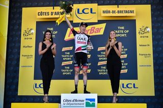 Dan Martin on the Tour de France podium after winning stage 6