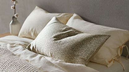 patterned silk pillowcase on a bed