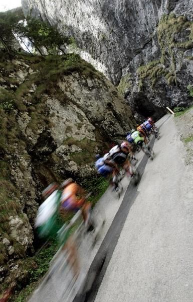 The Giro peloton negotiates a stage in the Italian Alps.