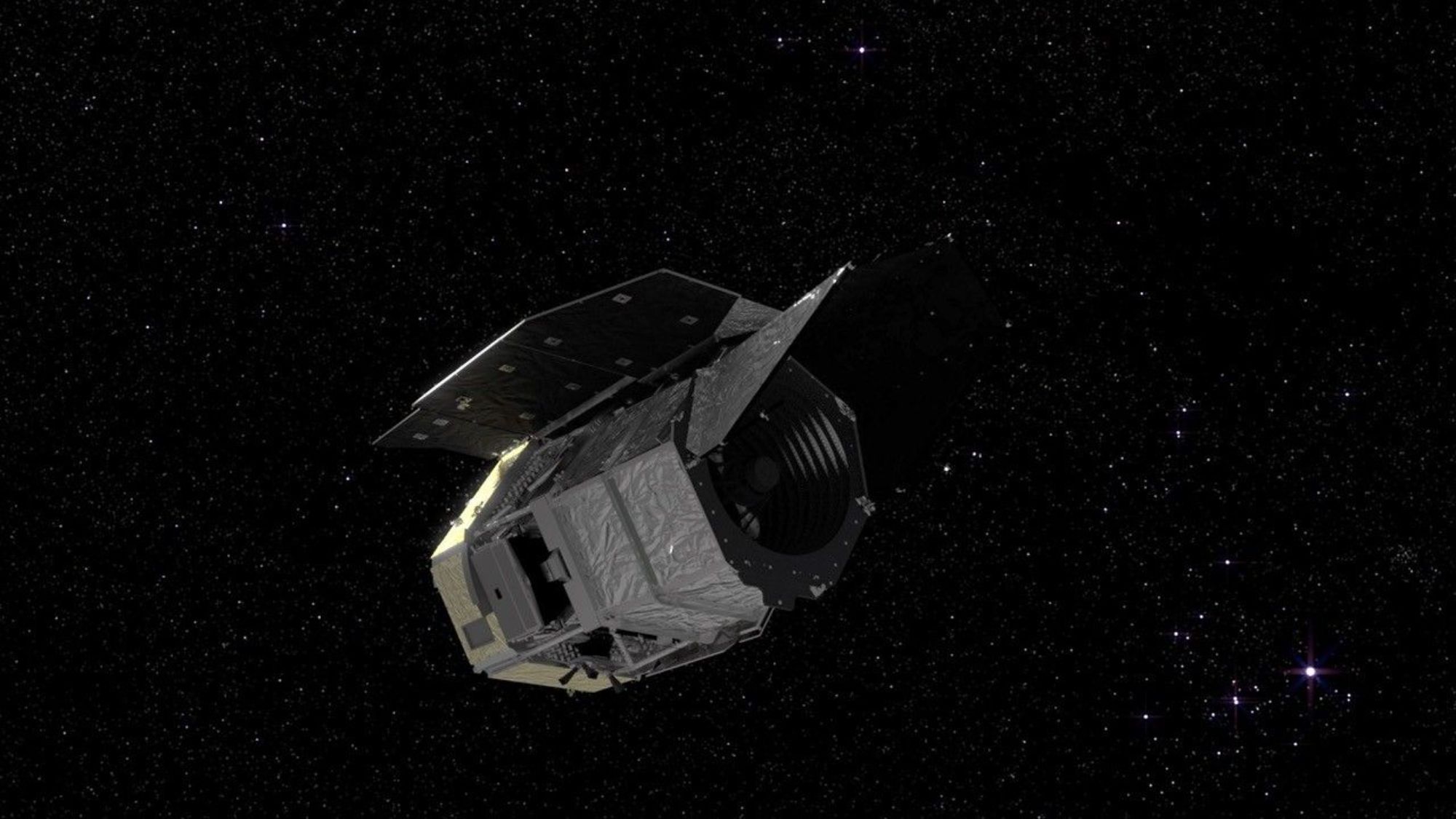 A visualization of a silvery spacecraft in a starry section of space.
