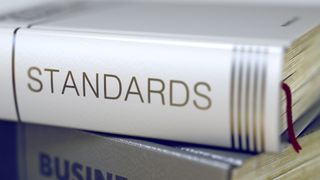 Closeup view of a book bearing the title "Standards" on the spine