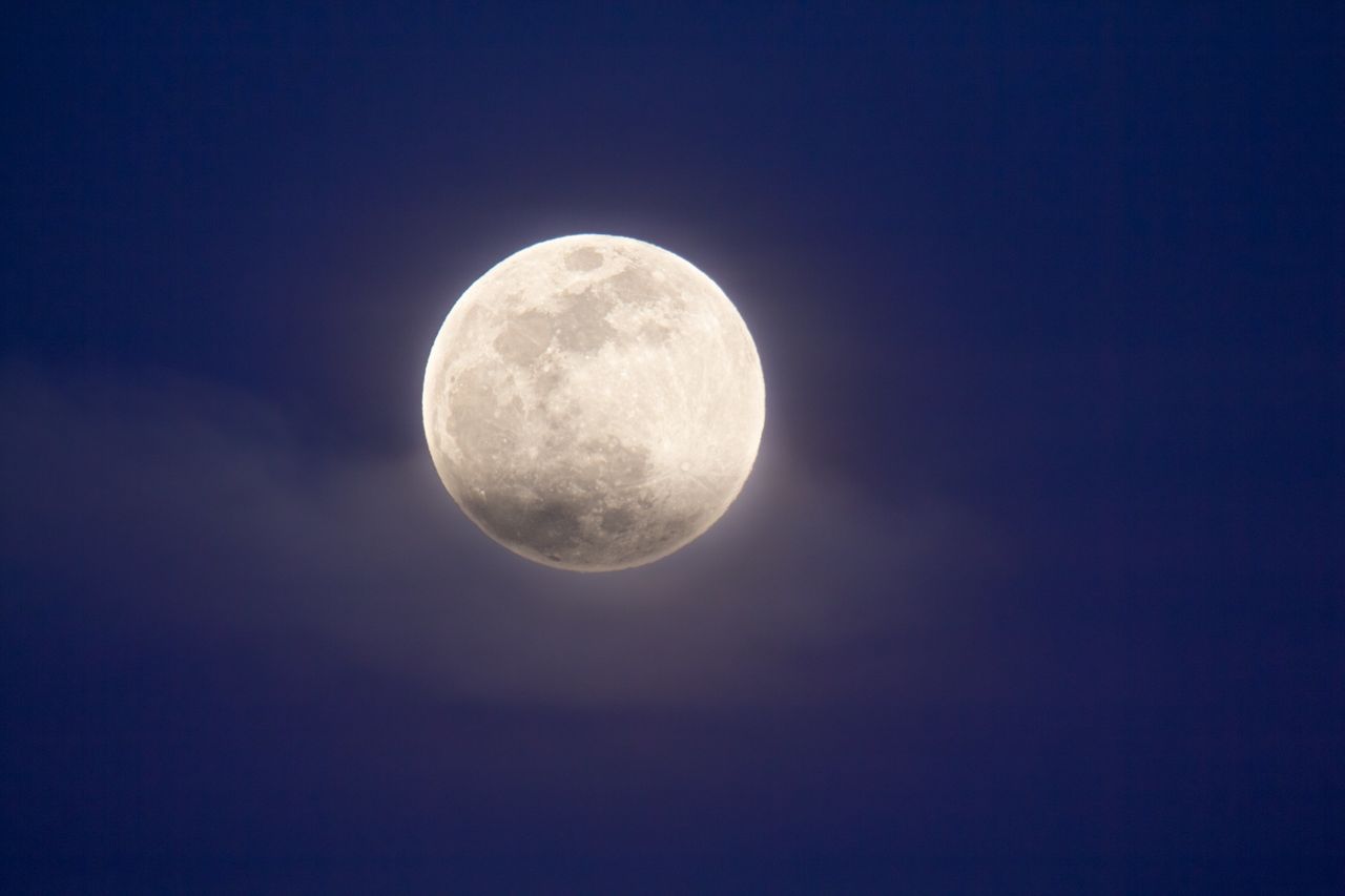 The nearly-full moon of May, known as the Flower Moon, gleams against the twilight sky in this photo taken by Kevin M. Gill of Los Angeles, California, on the evening of May 6, 2020. The moon reached full phase the next morning (May 7) at 6:45 a.m. EDT (1045 GMT). According to NASA, this was the fourth and final "supermoon" of 2020, although some astronomers disagree about whether it qualified as a "supermoon."