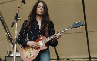 Scott Gorham performs onstage with Thin Lizzy at the Reading Festival on August 24, 1974