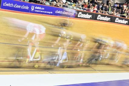 Riders are a blur on the Manchester velodrome.