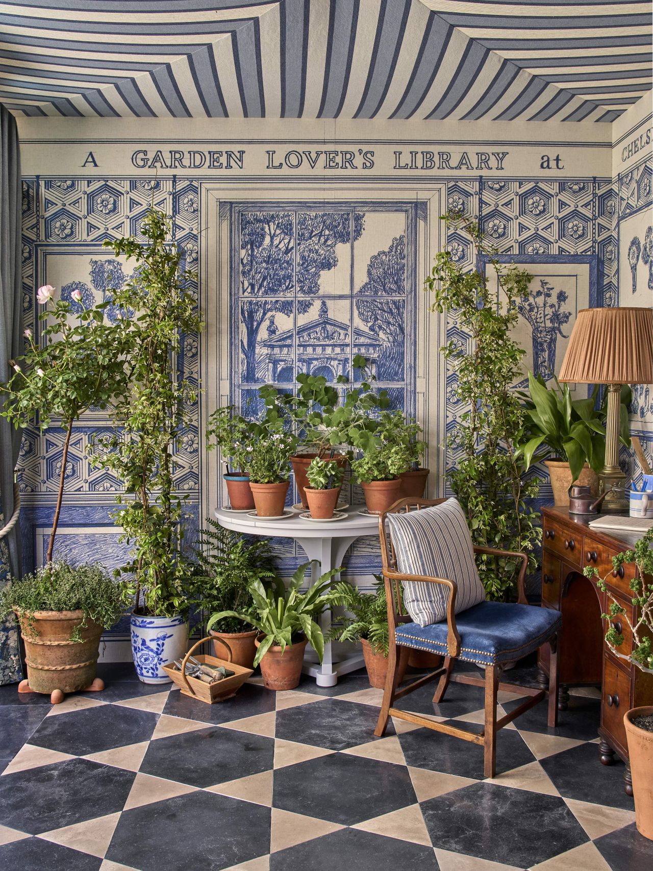 Images of the Garden Lover's Library at RHS Chelsea, showing details of the intricate stonework, books and plants