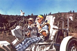 The last Apollo program geology field expedition before launch took place near Cinder Lake crater field, in the shadow of the San Francisco Peaks in November 1972. In this image, Gene Cernan and Jack Schmitt drive their lunar rover simulator over Bonita Lava Flow near Sunset Crater.