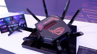 Asus ROG Rapture GT-BE19000 Wi-Fi 7 router on a display stand