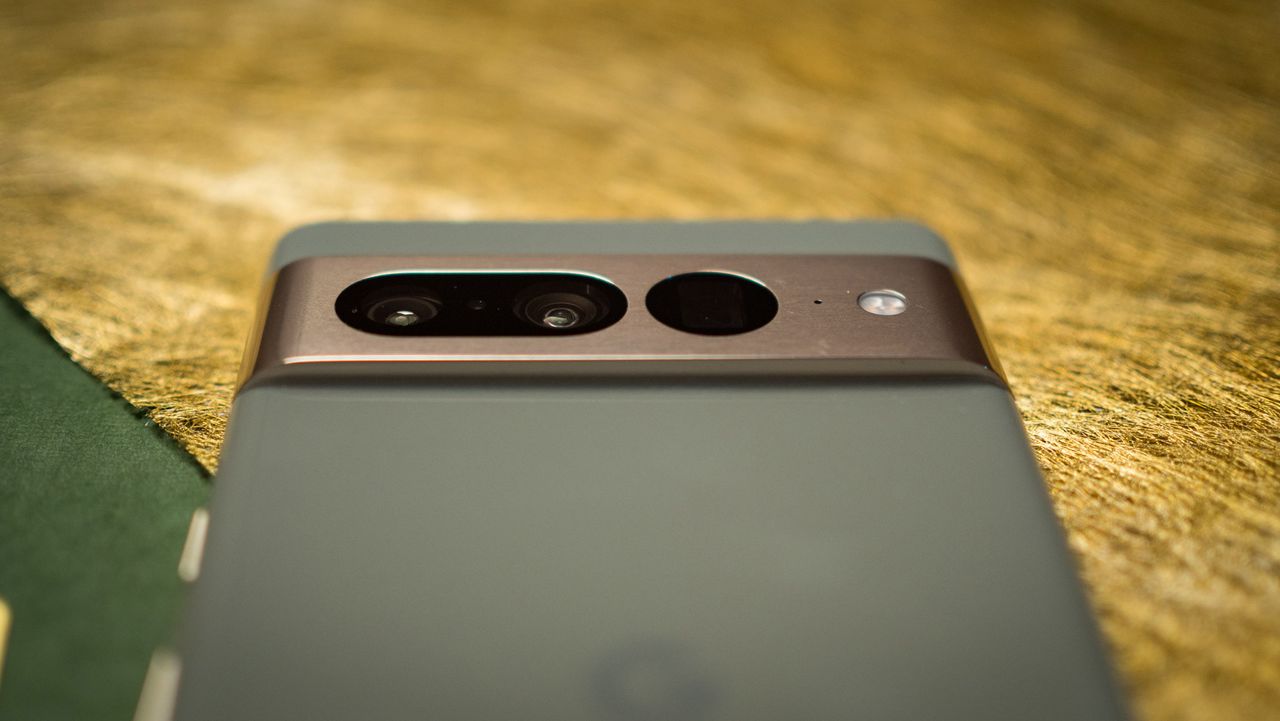 Google Pixel 7 Pro camera bar at the back against gold background