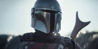 The Mandalorian standing in the daylight