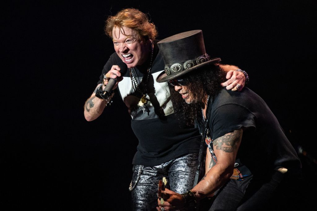 A photo of Axl Rose and Slash performing with Guns N&#039; Roses in 2023