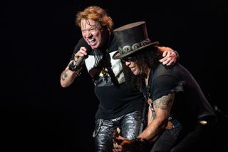 A photo of Axl Rose and Slash performing with Guns N' Roses in 2023