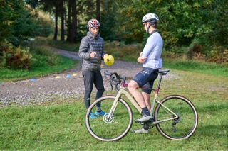 Off-road cycling coach instructing Andy Turner ahead of the first exercise