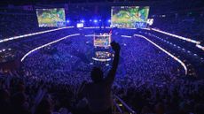A cheering crowd at an esports event at the State Farm Arena in Atlanta, Georgia 